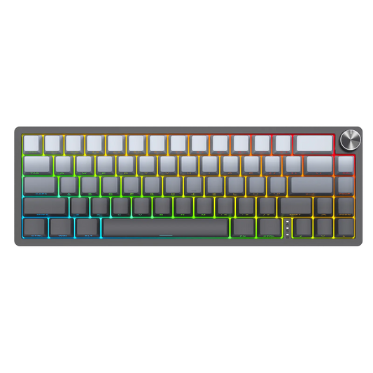 Compact mechanical keyboard close-up with RGB backlit keycaps in blue, green, and yellow