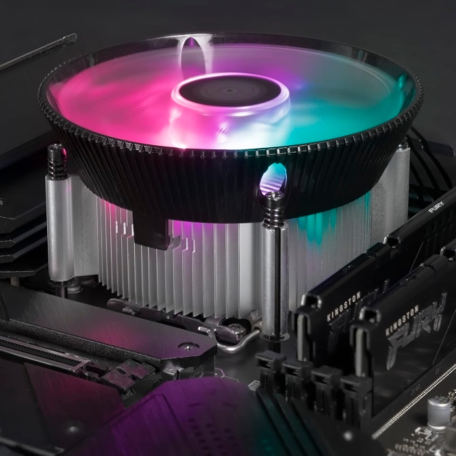 Computer CPU cooler with RGB lighting on a motherboard
