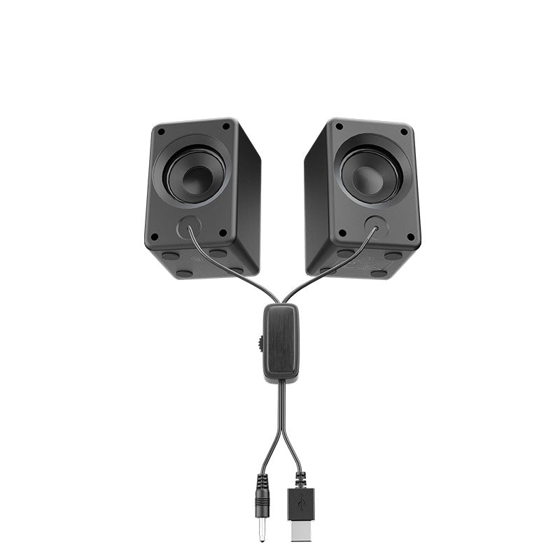 A pair of black computer speakers with a central inline volume control and dual audio cables, one ending in a 3.5mm jack and the other in a USB connector, shown on a white background with the COMPUTARS logo in the top right.