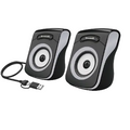 A pair of black and silver computer speakers with a black USB cable, shown on a clean white background.