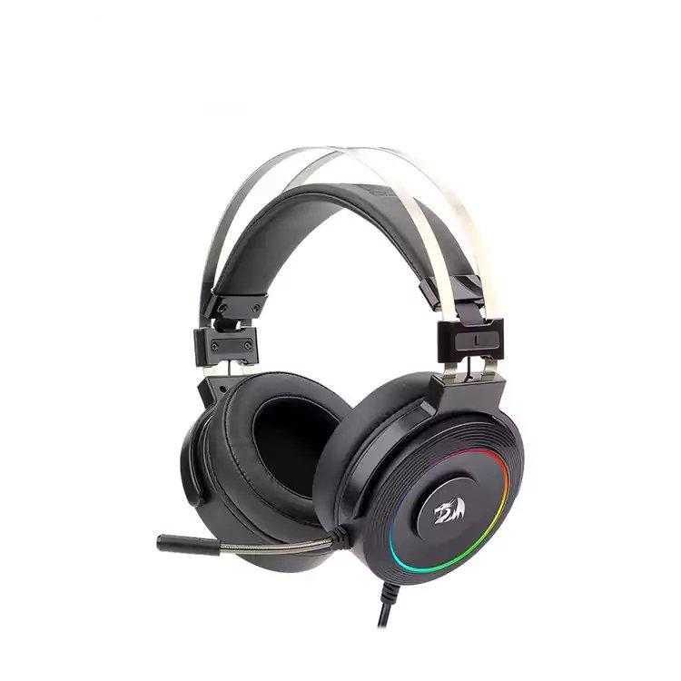Black over-ear gaming headset with a flexible boom microphone, clear headband support arms, and an RGB rainbow light ring on the ear cup. The Sigma Computer logo is visible in the top-left corner.