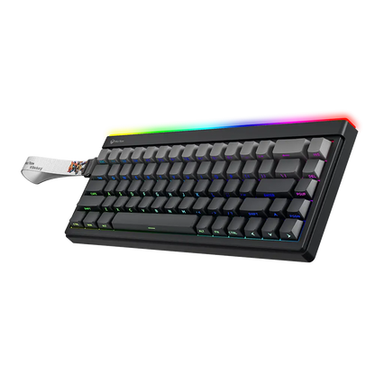 Gaming keyboard with rainbow RGB backlight and dark keycaps, angled view