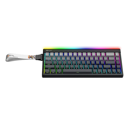 Gaming keyboard with rainbow RGB top lighting, black keys, left wrist strap