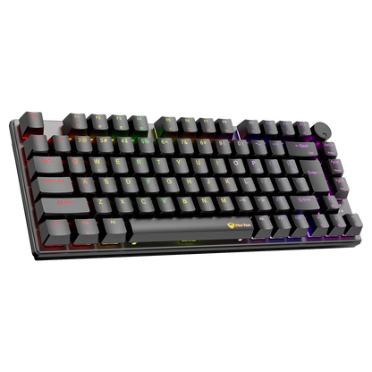 Close-up of 75% wired mechanical keyboard with RGB backlighting on black keycaps.