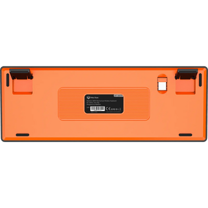 Wireless mechanical keyboard bottom cover in orange with label and mounting feet